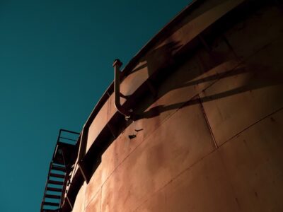 Large industrial tank against a clear blue sky