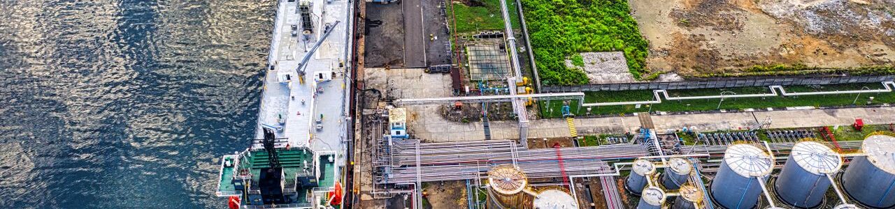 arial view of cargo ship and storage tanks