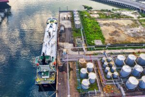 arial view of cargo ship and storage tanks