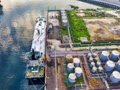 arial view of cargo ship and storage tanks