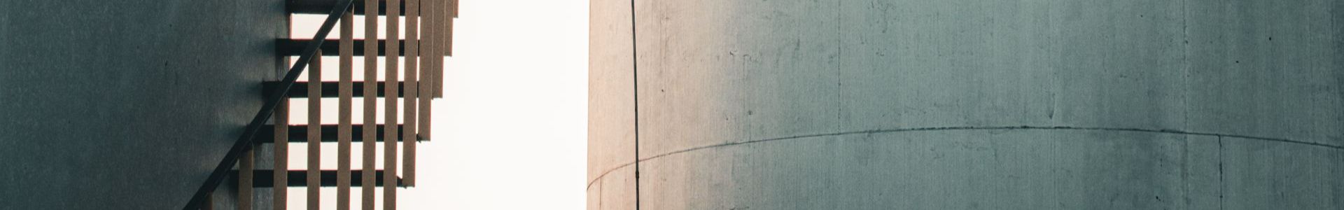 Industrial storage tanks with spiral staircase